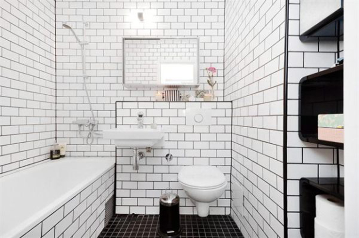 azulejos blancos con junta negra que baño